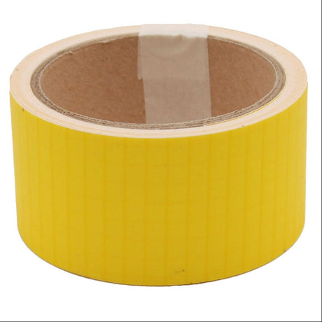 A roll of yellow Bainbridge ripstop nylon sail repair tape, 2 inches wide, against a white background.